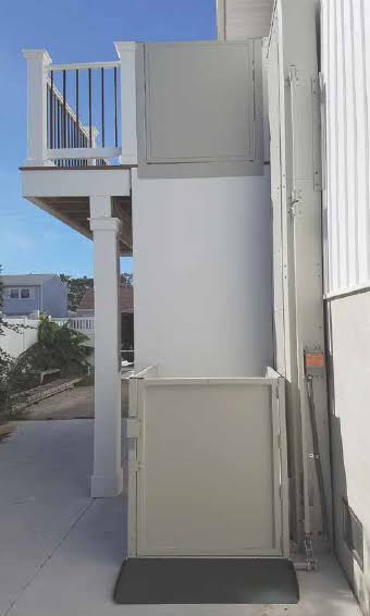 bruno VPL Donated Bruno Vertical Platform Lift (VPL) exterior installation